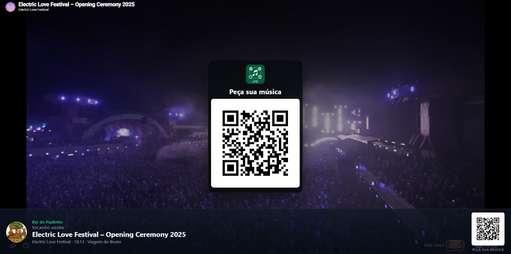 Player JKB na TV do estabelecimento: clipe tocando, QR para pedir música e informações da faixa